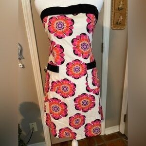 Z Universe 90s strapless dress with large whimsical daisies & black trim.